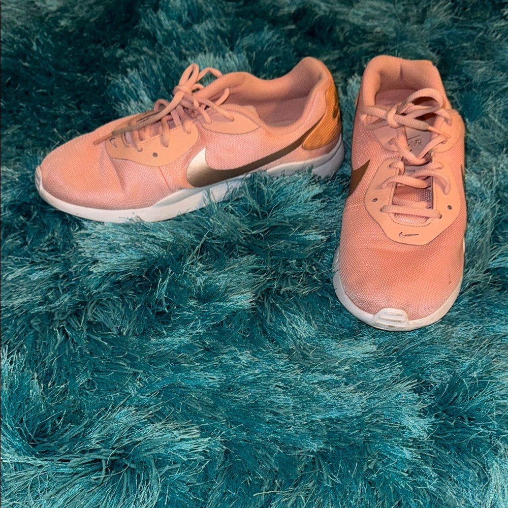 Nike Pink and Gold Sneakers with Streamlined Design